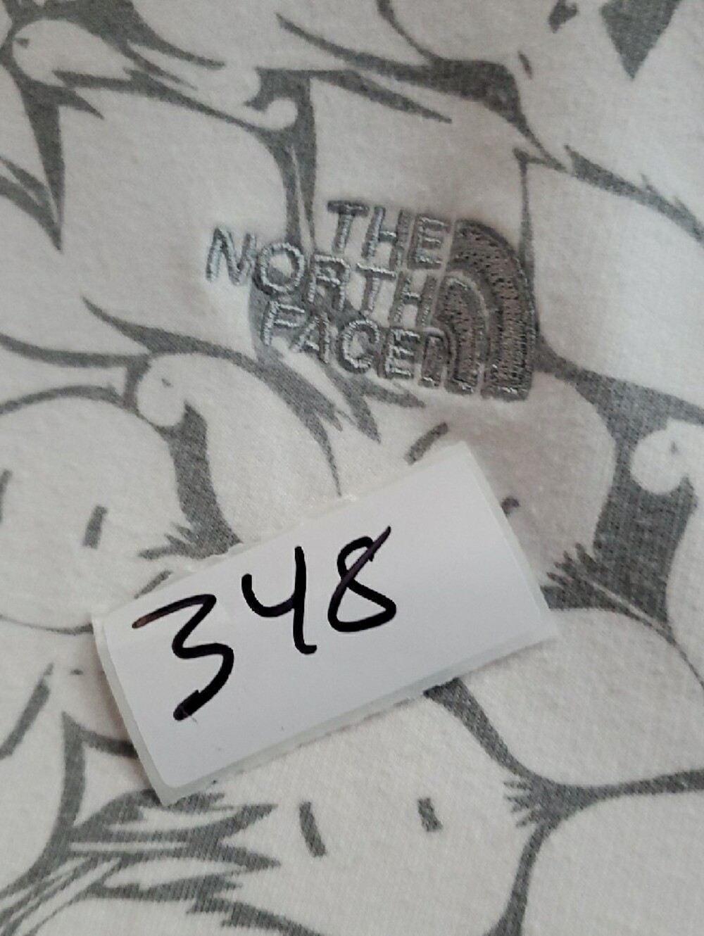 The North Face White Jacket with Gray Floral Pattern - Picture 9 of 9